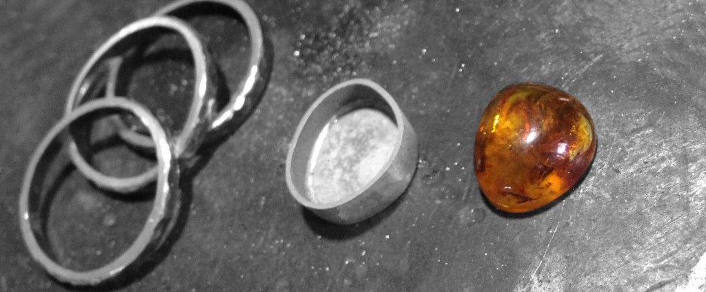 How to make an Amber ring - I was asked to produce an organic Amber ring for my clients girlfriend, she asked for three thin bands, rough textured with a small amber stone to be the source of the piece...