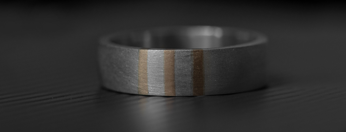 Bespoke, hand-crafted gold-and-silver wedding band for men